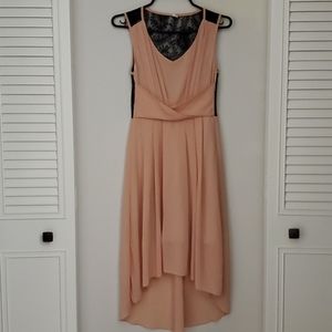 Peachy beach dress with black laced back